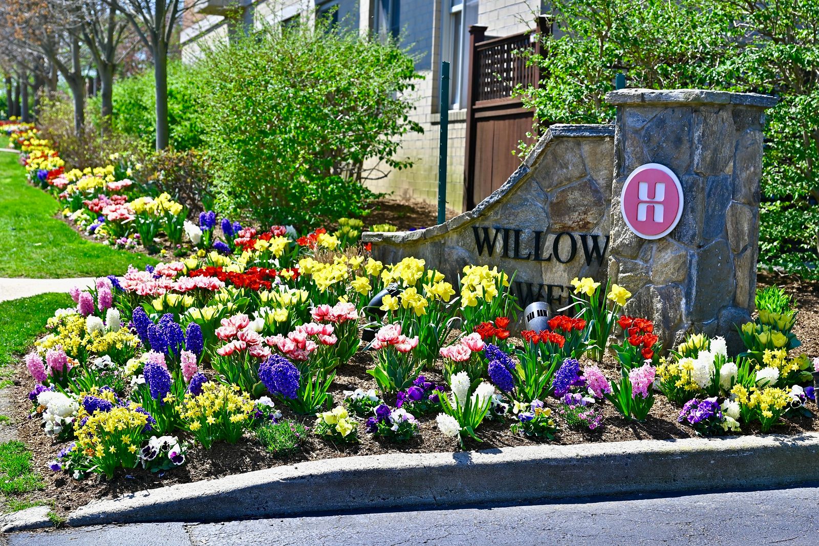 Willow Towers - Flowers With Sign